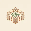 Picket garden fence enclosing a patch of growing plants